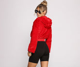 Veste à capuche faussement tendance